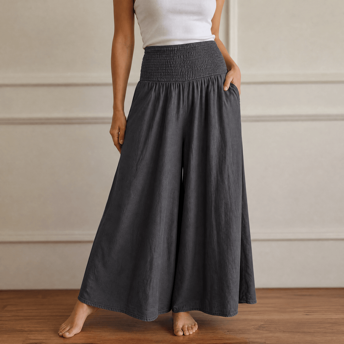 Dagny smocked wide-leg trousers in Charcoal Black