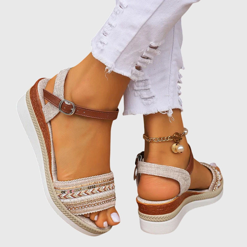 Esmae wedge sandals worn, buckle ankle strap and slingback detail