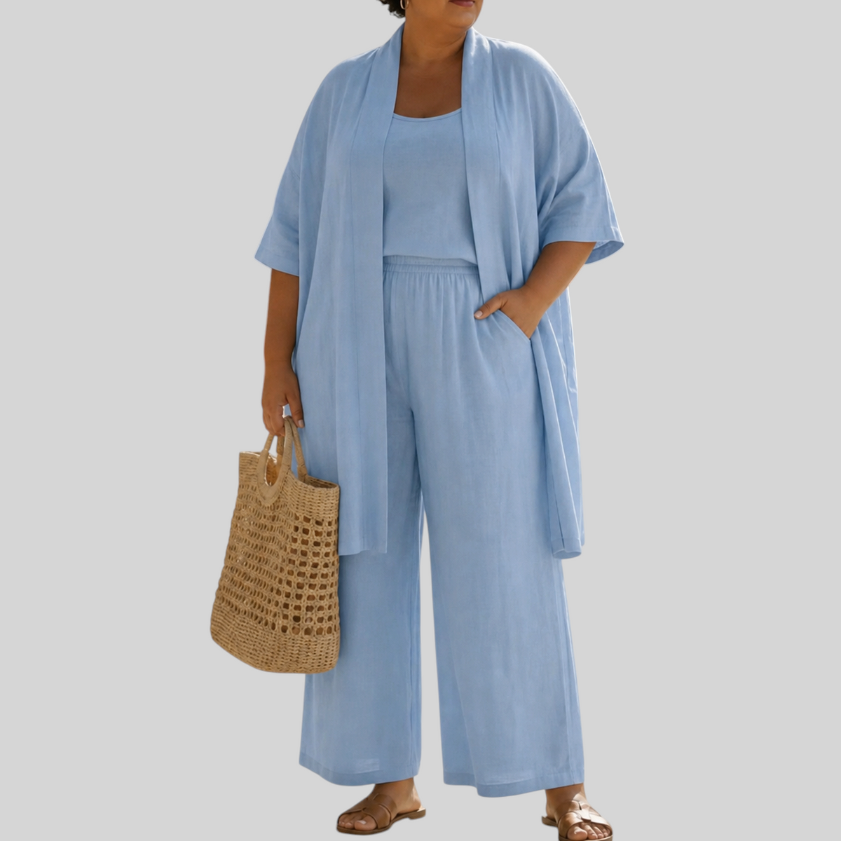 Wattle & Vale Melbourne lichtblauwe driedelige set met wijde broek, top en lang vest in een linnen-look stof.